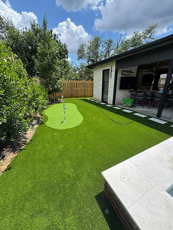 Outdoor living space artificial turf installation