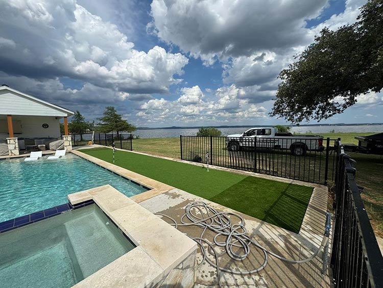 Poolside artificial turf installation